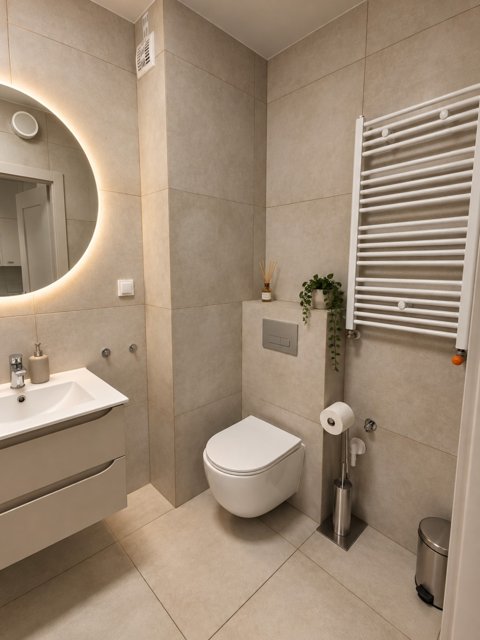 Łazienka z zabudową WC — kawalerka 23 m², Gdańsk Śródmieście